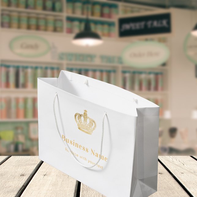 Varumärkesguld kunglig krona pappersshoppingpåse (Skapare uppladdad)