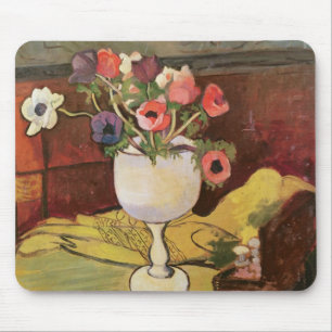 Vas av blommor, anemoner i ett vitexponeringsglas musmatta