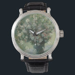 Vas i Flowers av Claude Monet Armbandsur<br><div class="desc">Vas of Flowers (1881/82) av Claude Monet är en vintage av konstnärlig blommigt som fortfarande målar upp bra. En bukett av blommande blommor från vår-årshelgen i ett blått vas. Om konstnären: Claude Monet (1840-1926) var en av grundarna av den Fransk målningsrörelsen och de flesta av hans målningar var "en plein...</div>