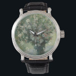 Vas med blommor av Claude Monet Armbandsur<br><div class="desc">Vas med blommor (1881/82) av Claude Monet är en vintage impressionistisk blomstilleben-finkonst målning. En bukett av blommande vårblommor i en blå vas. Om konstnären: Claude Monet (1840-1926) var en grundare av den franska impressionistiska målarrörelsen med de flesta av hans målningar som är "en plein air" (i det fria) stilen impressionistiska...</div>