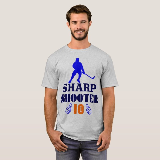 🏆 Vass Shooter 10 American Manar Classic Basic T Shirt (Hel framsida)