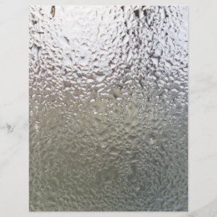 Vatten droppar på glas reklamblad