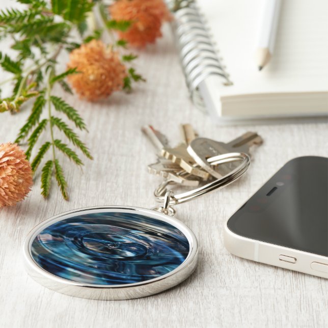 Vatten Keychain - Adiela Akoo Rund Silverfärgad Nyckelring (Sidan)