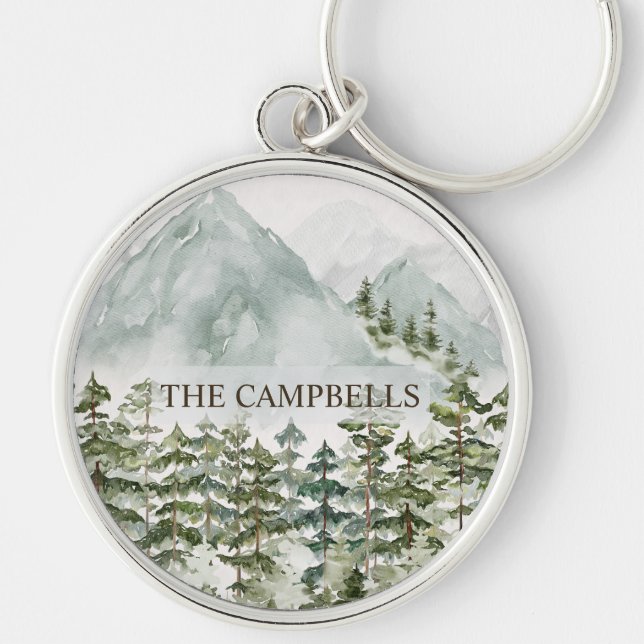 Vattenfärg i skogen och bergsmiljön rund silverfärgad nyckelring (Framsidan)