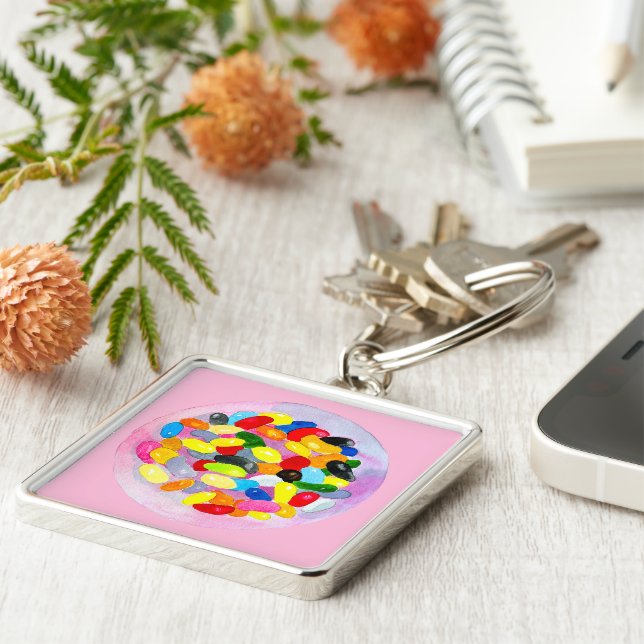 Vattenfärg på gelégodis i roligt fyrkantig silverfärgad nyckelring (Sidan)