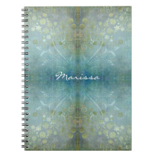 Vattenfärgrullan virvlar runt texturerade moderna anteckningsbok