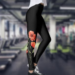 Vattenfärgsbitar på svart leggings<br><div class="desc">Snyggt svarta baljor med vattenfärgade röda vallmo på båda yttre benen</div>