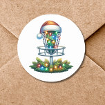 Vattenfärgsskiva Golf Thame-jul Runt Klistermärke<br><div class="desc">Tecknad golf basket dekorerade i julklapp ljus med en julhatt på. Redigera texten på baksidan i området Anpassa.</div>
