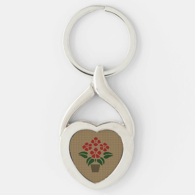 Vävd julstjärna twisted heart silverfärgad nyckelring (Framsidan)