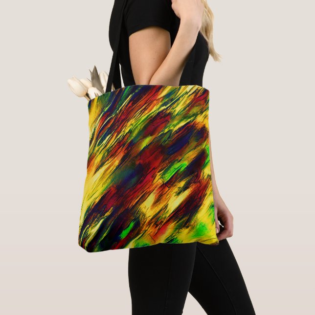 Växlade nedfläckader från rött till gult, lite grö tygkasse (Närbild)