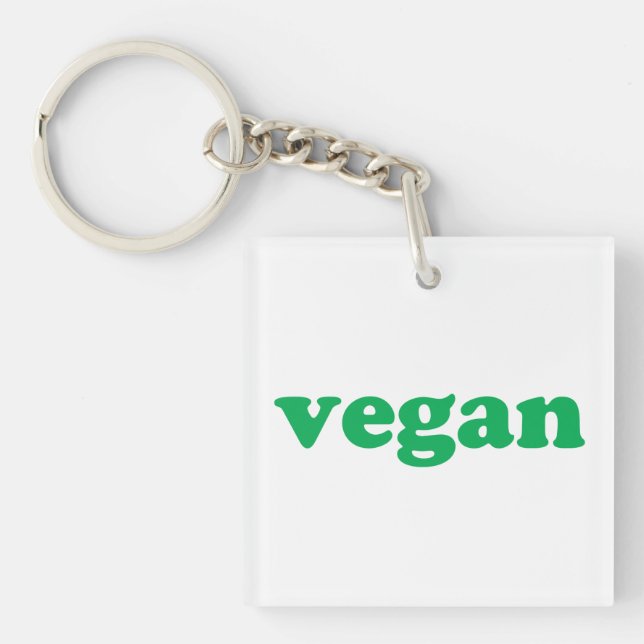 "vegan" grönt brev, vit bakgrund (Framsidan)