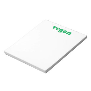"vegan" grönt brev, vit bakgrund anteckningsblock