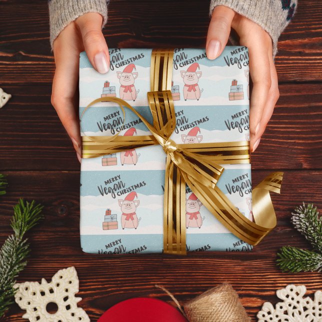 Vegan-jul med tecknad smågris och presenter presentpapper (Skapare uppladdad)