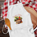 Vegetable Basket Personlig Kitchen Bib Apron Förkläde<br><div class="desc">Köksbrickor med grönsaksdesign. Anpassa med kockens namn i rosa skript ovanför designen. Ett basket som är rikt på trädgårdsveggier. Den vita,  bibapron har fickor framtill. Färg är rött,  orange,  grönt och solbränna. Gör en fin gåva till vegetarian eller vegankocken.</div>