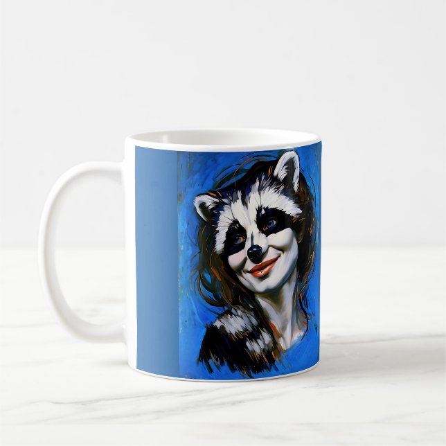 ’Velka Teyani’ Whispering Raccoon Trickster Kaffemugg (Vänster)