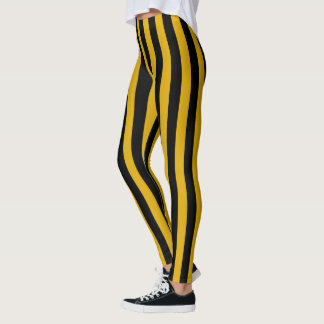 Vertikala guld- och svartrandar leggings