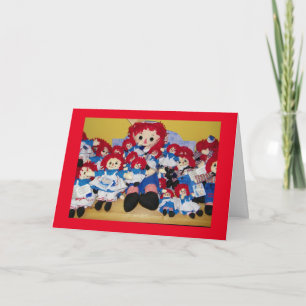 "VI ÖNSKAR ALLA ER GOD JUL" RAGGEDYANN HELGKORT