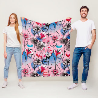 Vibrant, blommigt hjärta och blommor i monogram fleecefilt