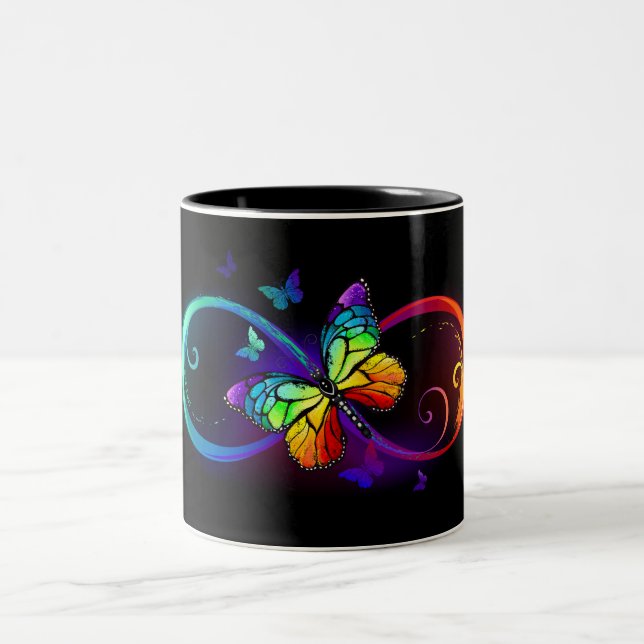 Vibrant infinity with rainbow butterfly on black Två-Tonad mugg (Center)