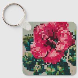 Vibrant pink hibiscus pixel art nyckelring