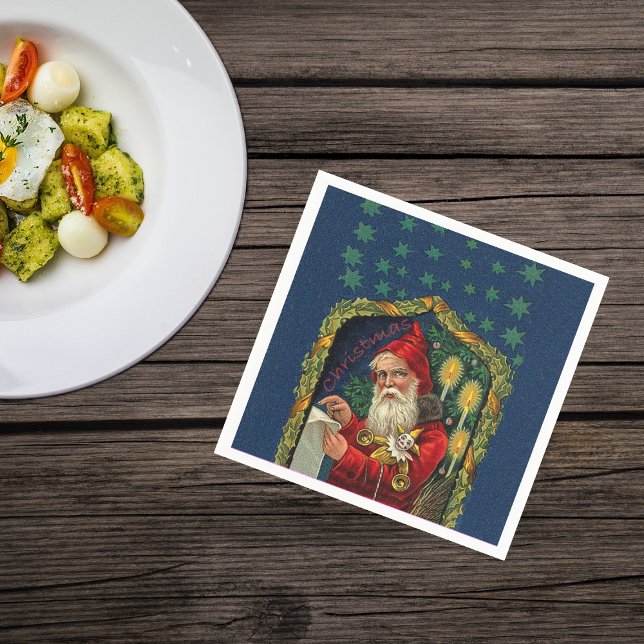 Victorian Santa Checking List Candles Holly Pappersservett (Victorian Santa Claus checking his list candles stars on dark blue Christmas napkins.)