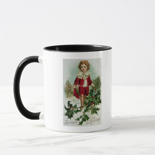 Victorianjulvykort som visar en pojke mugg (Vänster)