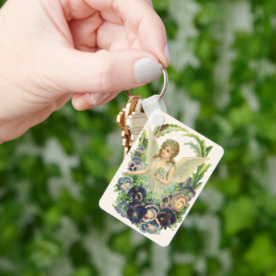 Victoriansk påskängel med lila penséblommor nyckelring