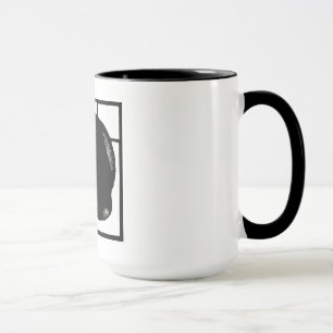 Victorianträsnittkattunge på muggen mugg