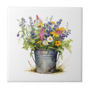 Vild blommor i en hink kakelplatta