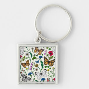 Vild blommor och fjärilar på vitt fyrkantig silverfärgad nyckelring