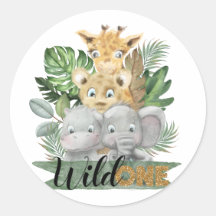 Vild ett av safaridjuren och det tropiska löven