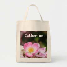 Vild rosa ros blomma toteväska. Lägg till ditt nam