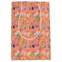 Vilda akvarellblommor på orange