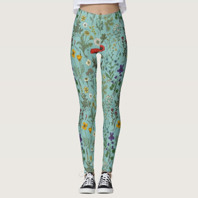 Vildblommor collage på blå bakgrund leggings (Framsida)