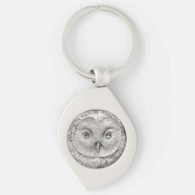 VILDSAKER: Den silverUral ugglan myntar - Swirl Silverfärgad Nyckelring (Framsidan)