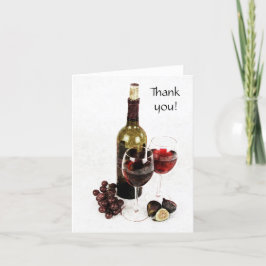 vin flaska, vin glas och tackkort av frukt och bär