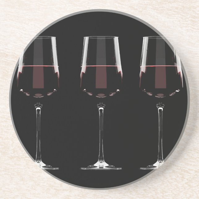 Vin-glas med rött vin på svart underlägg (Framsidan)