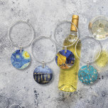 Vincent van Gogh Masterbit Paintings Berlock Vinglas<br><div class="desc">En uppsättning vincharmer med landskap av Vincent van Gogh (1853-1890),  en nederländsk konstnär,  inklusive Starry Night (1889),  Starry Night over the Rhone (1888),  Cafe Terrace (1888) och Blossoming Almond Träd (1890) några av hans mest välkända målningar.</div>