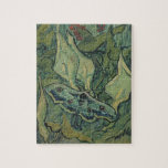 Vincent van Gogh - Stora påfågelsspinnaren Pussel<br><div class="desc">Stor påfågelspinnare (1889) av Vincent van Gogh är en vintage stilleben inom postimpressionism föreställande natur. En insekten,  påfågelspinnaren,  i en vårträdgård med kallaliljor och andra växter. Van Gogh kallade den för en "dödskallefjäril" och målade en dödskalle på baksidan av dess kropp.</div>