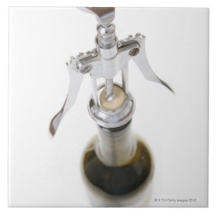 Vinflaska med corkscrew.en kakelplatta