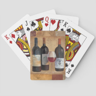 Vinflaskor med exponeringsglas spel kort