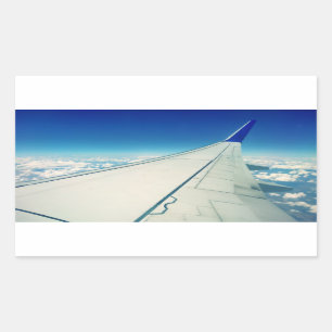 Vinge-vy från flygplan under flygning rektangulärt klistermärke