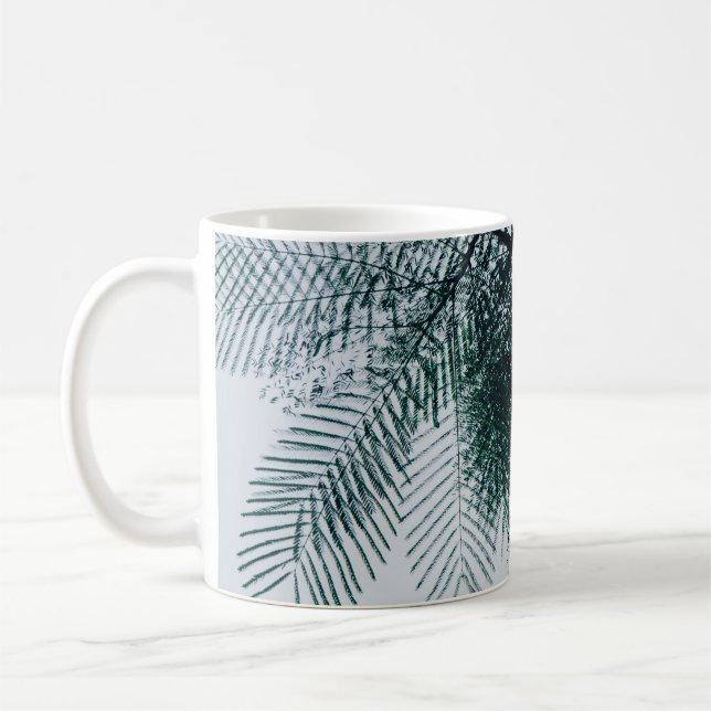 Vinkelt foto av grönt träd kaffemugg (Vänster)