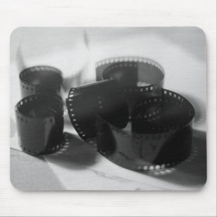 Vintage 35 mm filmremsor i svartvitt musmatta