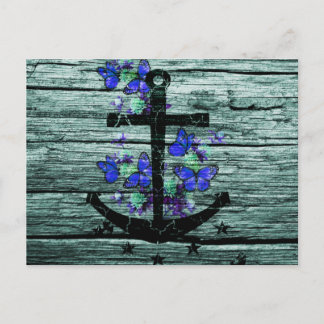 Vintage av trä och svart fästpunkt med blå fjärila vykort