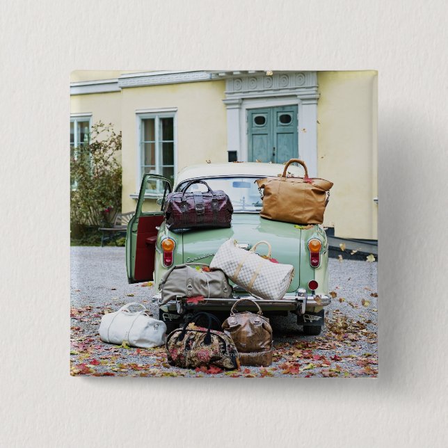 Vintage bil med mycket bagage knapp (Framsida)