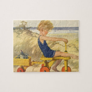 Vintage Boy som spelar vid Beach med Sand Leksaker Pussel