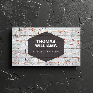 VINTAGE EMBLEM LOGOTYP PÅ RUSTIC BRICK WALL VISITKORT