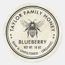 Vintage etikett för blåbärshonung med honungsbin