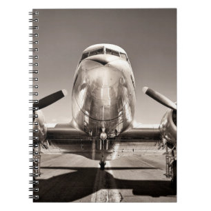 vintage flygplan på bana anteckningsbok